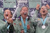 The Cancer Research UK Women's Boat Race 2018: The Cambridge women celebrating with their Boat Race medals, the Women's Boat Race trophy, and lots of Chapel Down Brut. Alice White, Paula Wesselmann, and Myriam Goudet-Boukhatmi  (I guess!).
River Thames between Putney Bridge and Mortlake,
London SW15,

United Kingdom,
on 24 March 2018 at 17:09, image #277