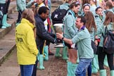 The Cancer Research UK Women's Boat Race 2018: The Women's Boat Race trophy is carried away, with CUWBC club coordinator James Lee volunteering to drink the remaining Chapel Down Brut from it.
River Thames between Putney Bridge and Mortlake,
London SW15,

United Kingdom,
on 24 March 2018 at 17:15, image #318