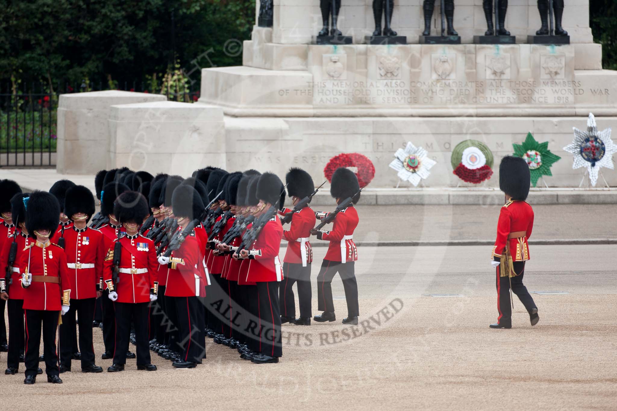 Trooping the Colour 2009: No. 3 Guard, 1st Battalion Irish Guards, changing position for the arrival of the Royal Procession. Behind them the Guards Memorial..
Horse Guards Parade, Westminster,
London SW1,

United Kingdom,
on 13 June 2009 at 10:43, image #82
