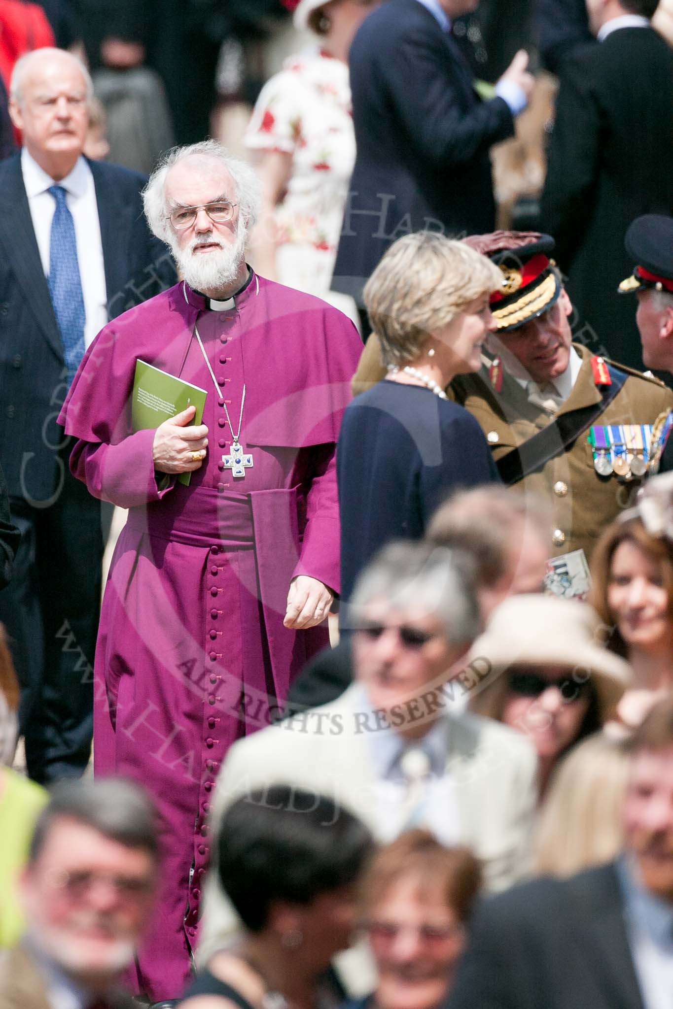 Trooping the Colour 2009: Rowan Williams, the Archbishop of Canterbury, leaving the grand stand after the parade, carrying a programme of the parade..
Horse Guards Parade, Westminster,
London SW1,

United Kingdom,
on 13 June 2009 at 12:23, image #274
