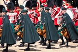Trooping the Colour 2009: Irish Guards Pipers in their bottle green tunics and saffron coloured kilts with a bottle green cape, in front of Drummers..
Horse Guards Parade, Westminster,
London SW1,

United Kingdom,
on 13 June 2009 at 11:17, image #180
