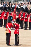 Trooping the Colour 2009: The Regimental Sergeant Major, WO1 Ross Martin, is handing over the Colour to the Ensign, 2nd Lieutenant Andrew Campbell, by placing it into his colour belt..
Horse Guards Parade, Westminster,
London SW1,

United Kingdom,
on 13 June 2009 at 11:21, image #187