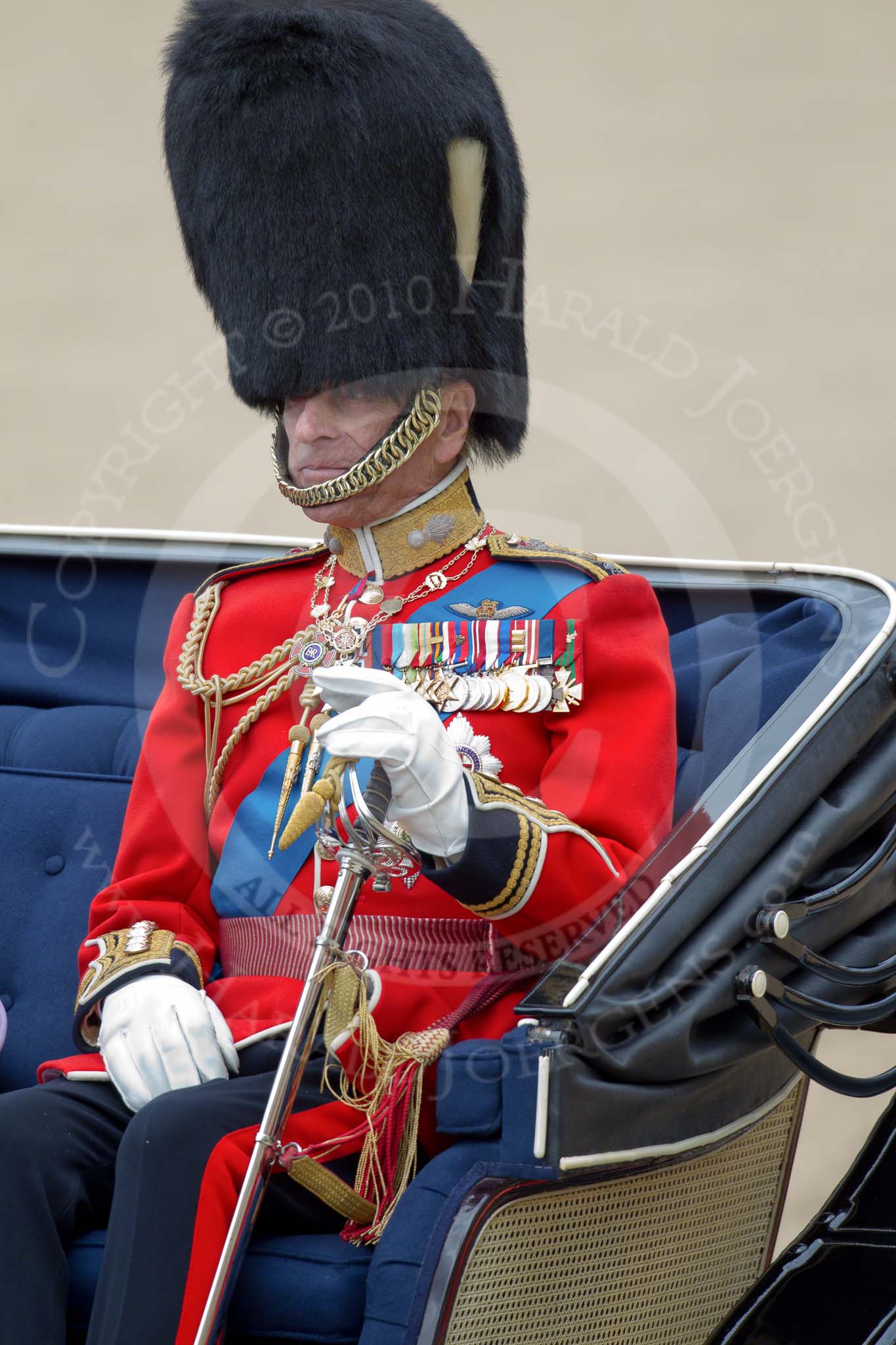 Trooping the Colour 2010: The Prince Philip, Duke of Edinburgh, Colonel Grenadier Guards, former Field Marshal, husband of Queen Elizabeth II.

In this photo, taken at the end of the parade, he is sitting in the Ivory Mounted Phaeton, ready to march off. The amount of details in this photo, and the sharpness, is amazing..
Horse Guards Parade, Westminster,
London SW1,
Greater London,
United Kingdom,
on 12 June 2010 at 12:10, image #192