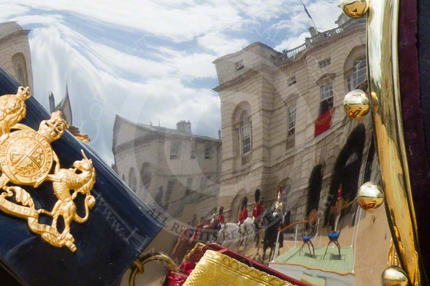 Trooping the Colour 2010: Colonel T W Browne, The Blues and Royals, Silver Stick in Waiting, at the end of parade, marching off.

Horse Guards Parade is beautifully reflected in the rear shield of his uniform (please correct me if "rear shield" is the wrong phrase!)..
Horse Guards Parade, Westminster,
London SW1,
Greater London,
United Kingdom,
on 12 June 2010 at 12:12, image #194