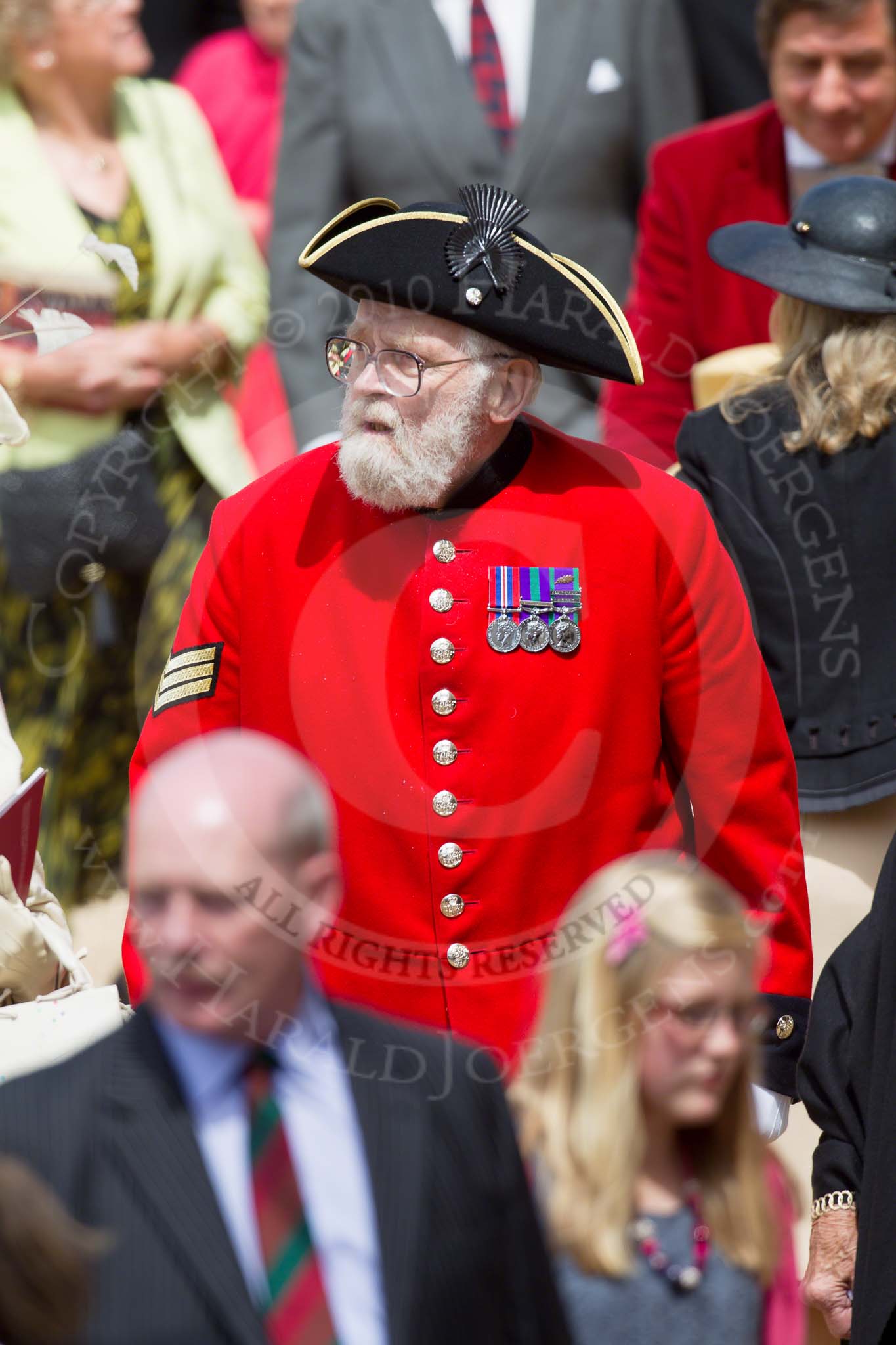 Trooping the Colour 2010: Chelsea Pensioners amongst the visitors leaving the event. The Chelsea Pensioners are former members of the British Army, living at the Royal Hospital Chelsea..
Horse Guards Parade, Westminster,
London SW1,
Greater London,
United Kingdom,
on 12 June 2010 at 12:17, image #196