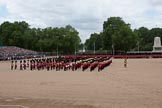 Trooping the Colour 2010: The Massed Bands marching and playing, lead by their Drum Majors.

Behind them No. 1 Guard, and No. 2 Guard,  1st Battalion Grenadier Guards, behind them
The King's Troop Royal Horse Artillery.

In the background St. James's Park, with a lake and a fountain, on the left spectators watching from a stand in front of No. 10 Downing Street Garden.

On the very right is the Guards Memorial, in front of the memorial the Mounted Bands of the Household Cavalry..
Horse Guards Parade, Westminster,
London SW1,
Greater London,
United Kingdom,
on 12 June 2010 at 11:13, image #115