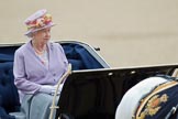 Trooping the Colour 2010: Her Majesty The Queen, sitting in her Ivory Monted Phaeton,  inspecting the line of soldiers on the parade ground..
Horse Guards Parade, Westminster,
London SW1,
Greater London,
United Kingdom,
on 12 June 2010 at 11:06, image #97