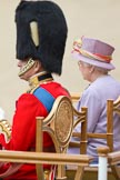 Trooping the Colour 2010: Her Majesty the Queen, Elizabeth II, and The Prince Philip. Duke of Edinburgh, during the "Massed Bands Troop", sitting in their chairs on the saluting dais..
Horse Guards Parade, Westminster,
London SW1,
Greater London,
United Kingdom,
on 12 June 2010 at 11:25, image #127