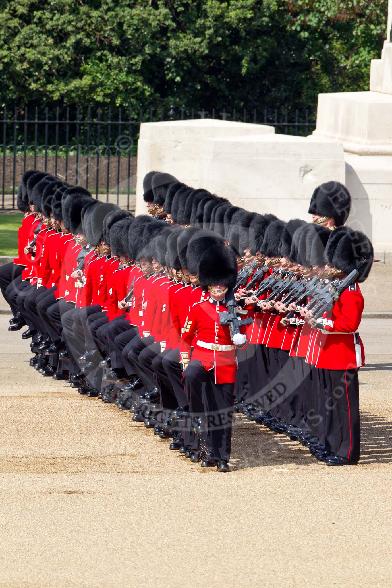 The Colonel's Review 2011: No. 3 Guard, F Company Scots Guards, taking up their place on the parade ground. In the background the Guards Memorial, in front Company Sergeant Major N D Lawrie..
Horse Guards Parade, Westminster,
London SW1,

United Kingdom,
on 04 June 2011 at 10:35, image #50