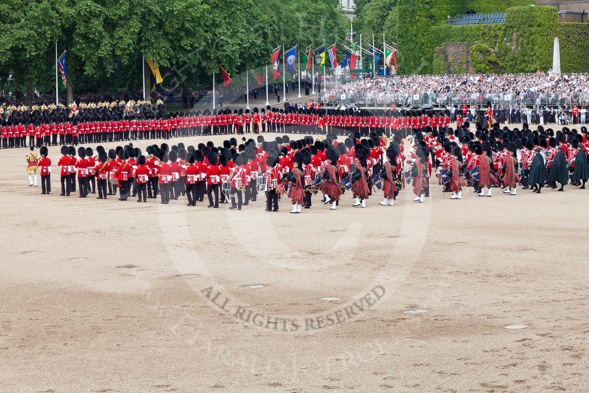 The Colonel's Review 2011: The Massed Bands during the Massed Bands Troop. In the rear the Pipers and Drummers of the Band of the Scots Guard, and, with the green capes, the Irish Guard Pipers..
Horse Guards Parade, Westminster,
London SW1,

United Kingdom,
on 04 June 2011 at 11:16, image #123
