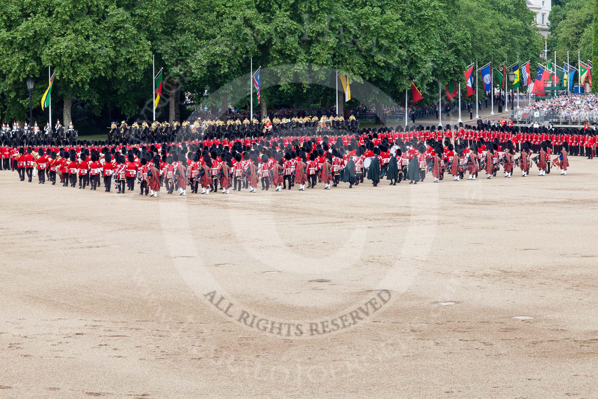The Colonel's Review 2011: The Massed Bands during the Massed Bands Troop. In the rear the Pipers and Drummers of the Band of the Scots Guard, and, with the green capes, the Irish Guard Pipers..
Horse Guards Parade, Westminster,
London SW1,

United Kingdom,
on 04 June 2011 at 11:17, image #124