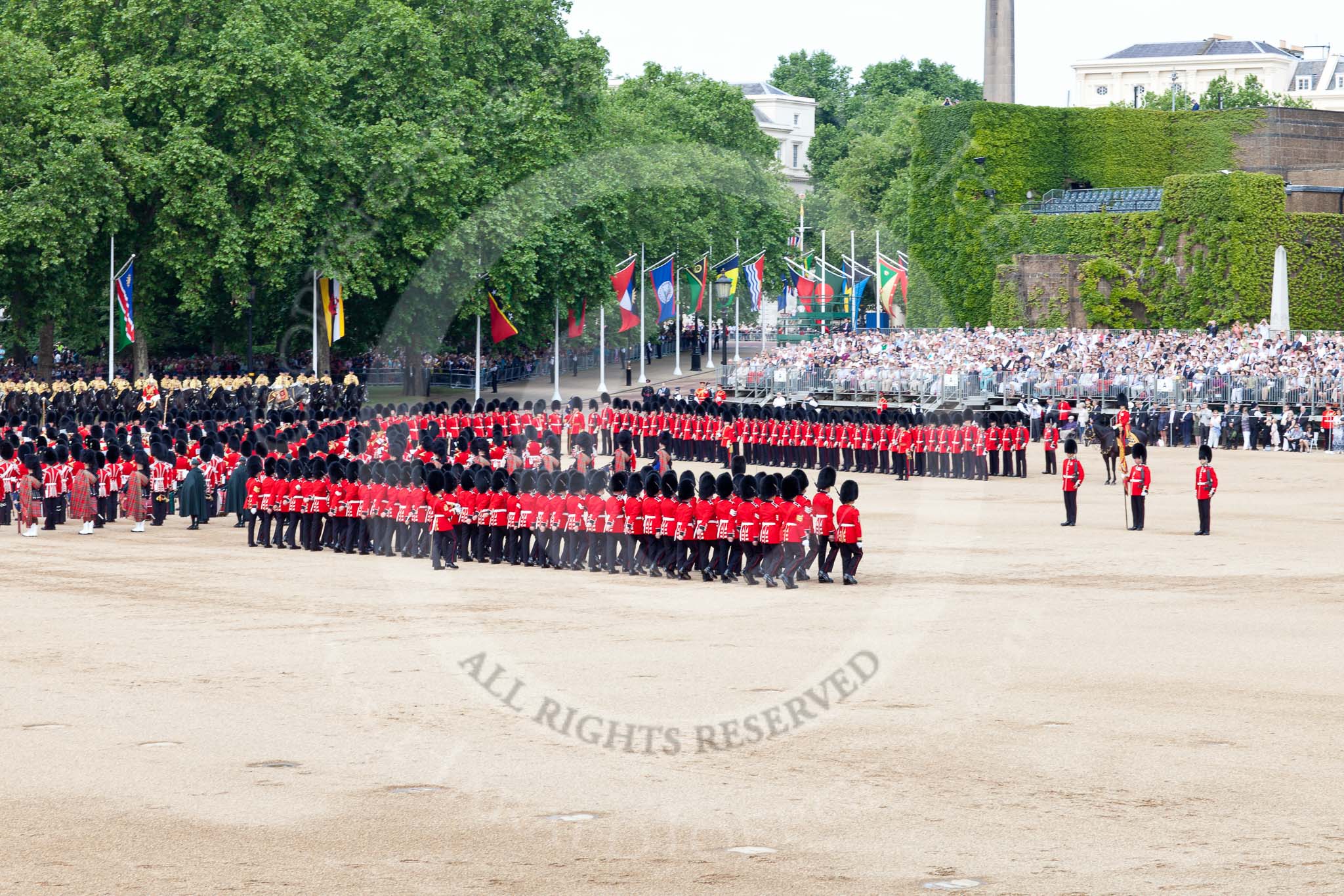 The Colonel's Review 2011: The Escort for the Colour, No.1 Guard, 1st Battalion Scots Guards, marching forward to collect the Colour. Colour Sergeant Chris Millin is holding the Colour, standing between the two sentries..
Horse Guards Parade, Westminster,
London SW1,

United Kingdom,
on 04 June 2011 at 11:17, image #126