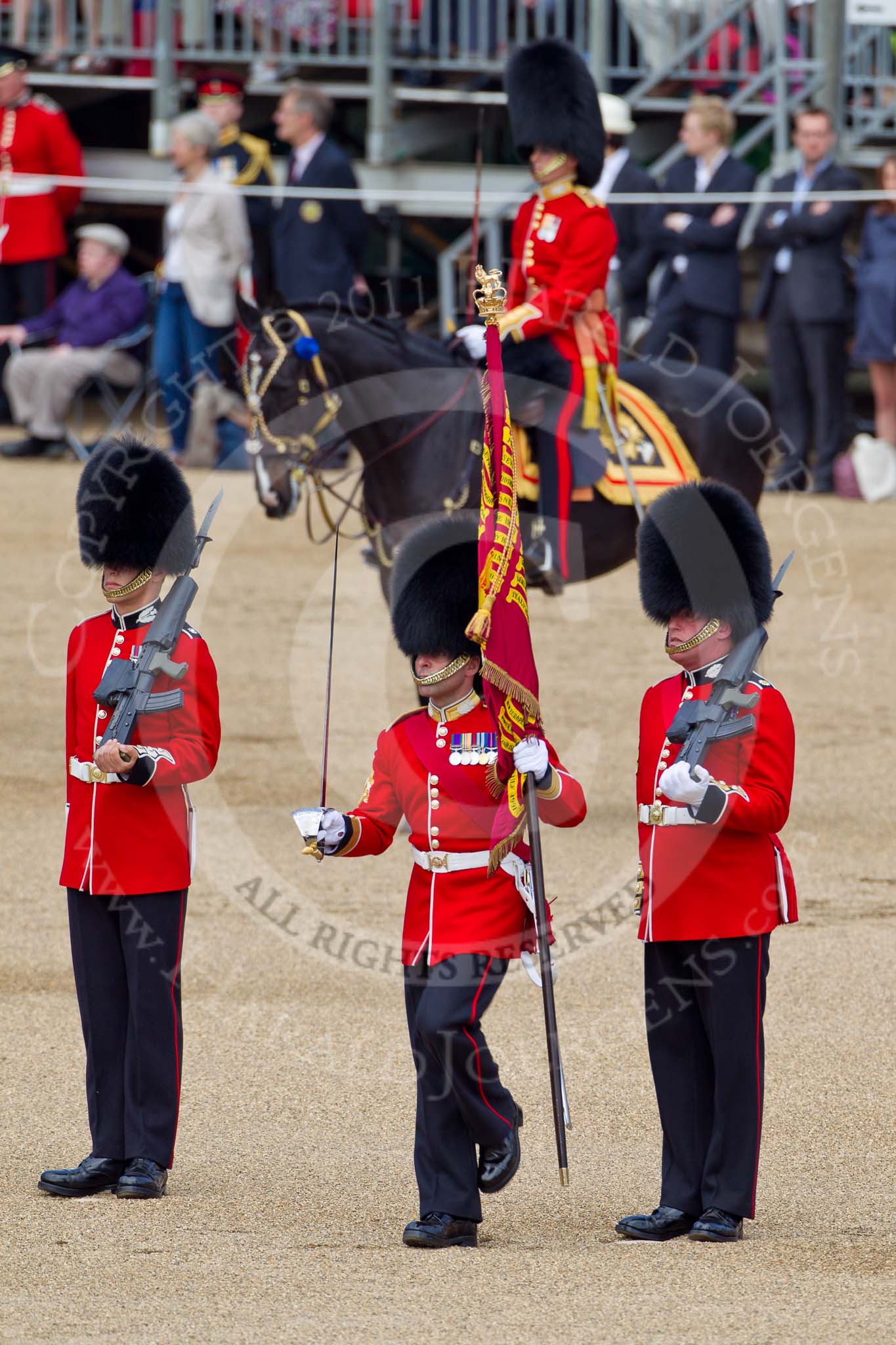 The Colonel's Review 2011: The Regimental Sergeant Major, A I Mackenzie, has taken the Colour from Colour Sergeant Chris Millin, and is about to give it to the Ensign..
Horse Guards Parade, Westminster,
London SW1,

United Kingdom,
on 04 June 2011 at 11:19, image #131