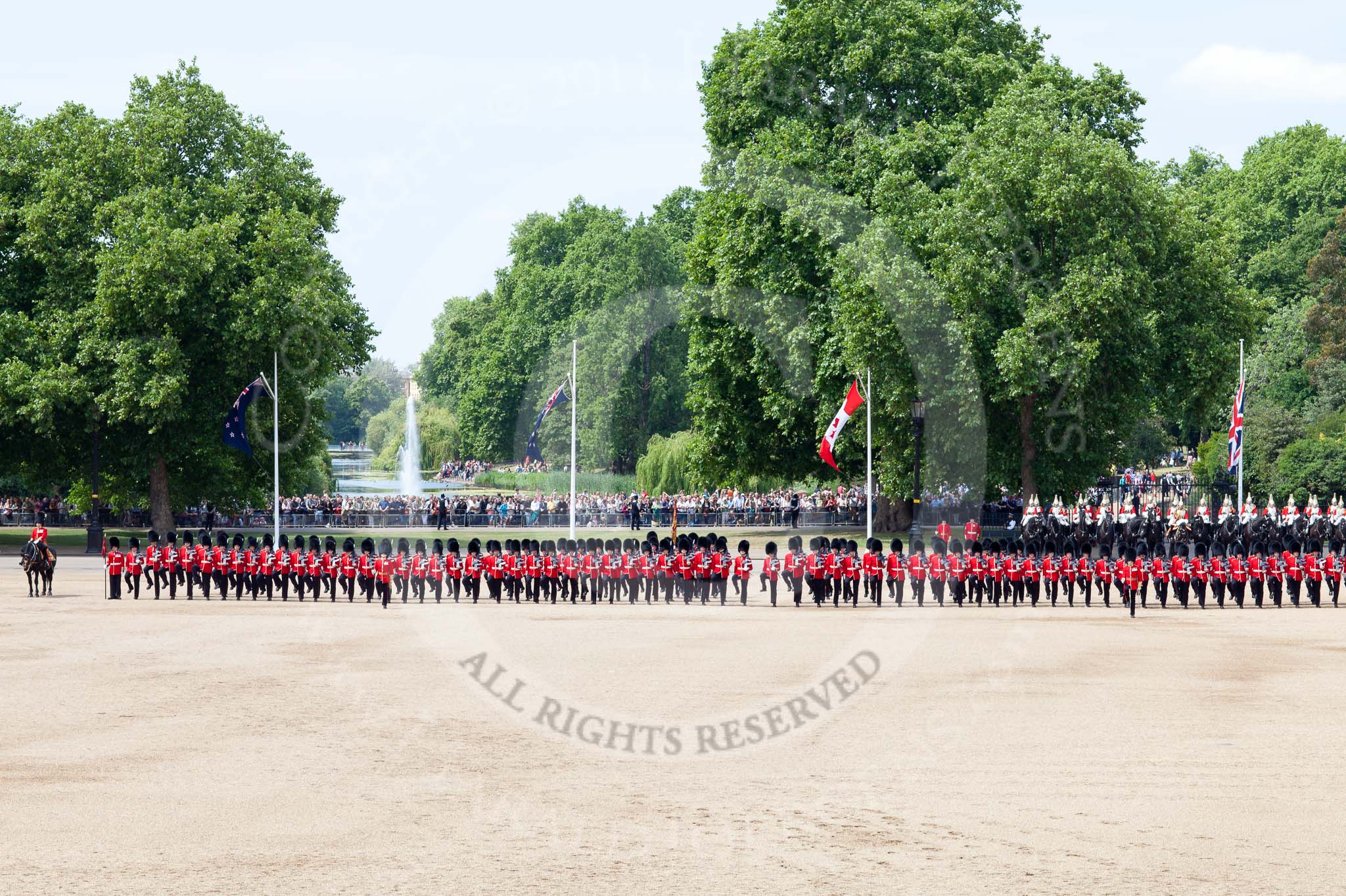 Photo 110604_114910_5D2_4905HaraldJoergens_ The Colonel's Review 2011: At the end of the March Past, the guards are getting back into their initial position as one long line of guardsman. In the background, spectators watching from St. James's Parl, with the lake and water feature..
Horse Guards Parade, Westminster,
London SW1,
United Kingdom,
on 04 June 2011 at 11:49, image #222