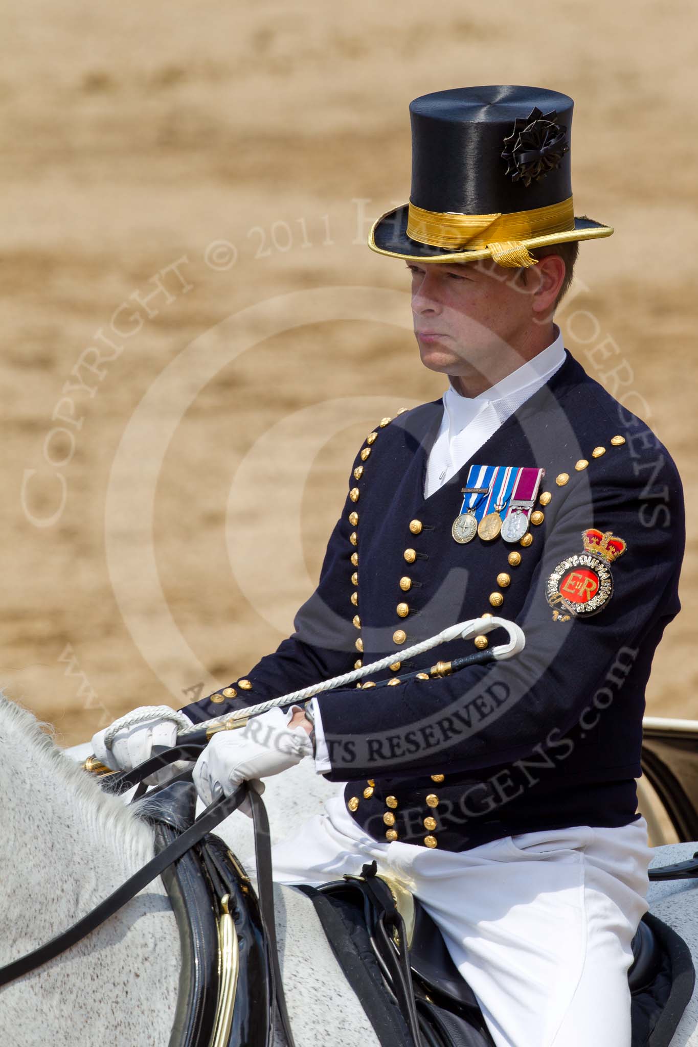The Colonel's Review 2011: Close-up of Head Coachman Jack Hargreaves, riding one of the two Windsor Grey horses..
Horse Guards Parade, Westminster,
London SW1,

United Kingdom,
on 04 June 2011 at 12:06, image #287