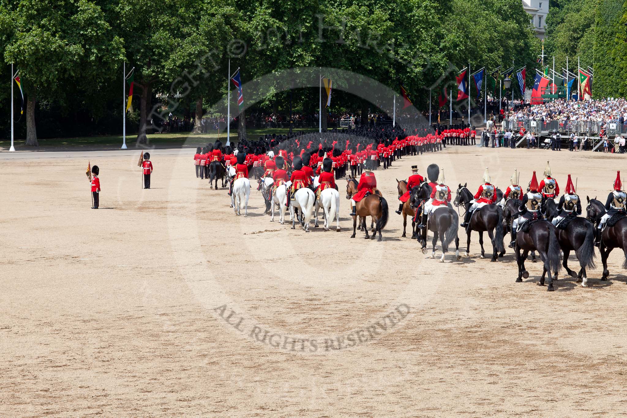 The Colonel's Review 2011: Marching Off - the guards leaving Horse Guards Parade, marching towards The Mall, followed by the Royal Procession, with the four Troopers of The Life Guards and the four Troopers of the Blues and Royals at the end..
Horse Guards Parade, Westminster,
London SW1,

United Kingdom,
on 04 June 2011 at 12:09, image #301