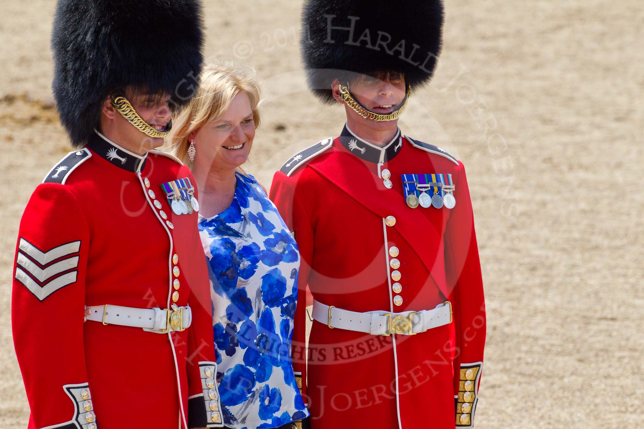 The Colonel's Review 2011: After the rehearsal - two guardsmen of the Welsh Guards, posing with a member of the public for a photo..
Horse Guards Parade, Westminster,
London SW1,

United Kingdom,
on 04 June 2011 at 12:21, image #314