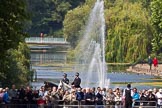 The Colonel's Review 2011: Spectators watching from St. James's Park in front of the lake and water feature. Officers of the Metropolitan Police on horseback patrolling..
Horse Guards Parade, Westminster,
London SW1,

United Kingdom,
on 04 June 2011 at 10:28, image #29