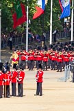The Colonel's Review 2011: Drum Major Alan Harvey, leading the Band of the Scots Guards onto the parade ground. In the background spectators watching from St. James's Park, in the foreground No. 5 Guard, 1st Battalion Welsh Guards..
Horse Guards Parade, Westminster,
London SW1,

United Kingdom,
on 04 June 2011 at 10:29, image #31