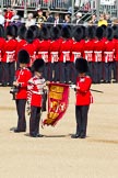 The Colonel's Review 2011: The Colour is uncased. Colour Sergeant Chris Millin is holding the flag, whilst the Duty Drummer holds the colour case. Behind the drummer, presenting arms, one of the two sentries..
Horse Guards Parade, Westminster,
London SW1,

United Kingdom,
on 04 June 2011 at 10:33, image #45