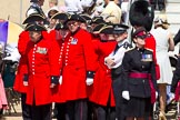 The Colonel's Review 2011: Chelsea Pensioners' (ex-servicemen and -women, in-pensioners living at the Royal Hospital Chelsea), in their scarlet coats and wearing their tricone hats, about to leave at the end of the rehearsal. On the right a captain from the Royal Army Medical Corps..
Horse Guards Parade, Westminster,
London SW1,

United Kingdom,
on 04 June 2011 at 12:13, image #309
