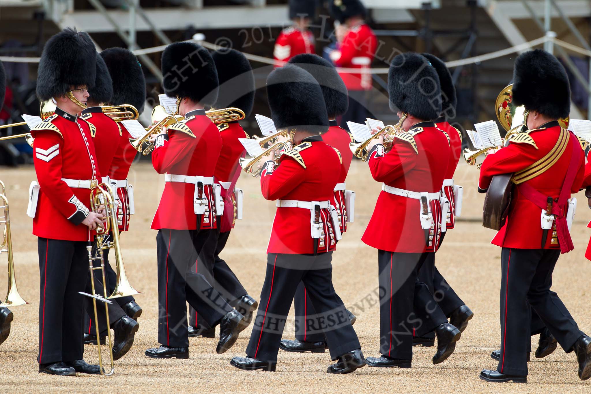 The Major General's Review 2011: Musicians of the Band of the Irish Guards arriving at Horse Guards Parade, passing musicians of the Band of the Welsh Guards that are already at their desigated location..
Horse Guards Parade, Westminster,
London SW1,
Greater London,
United Kingdom,
on 28 May 2011 at 10:18, image #26