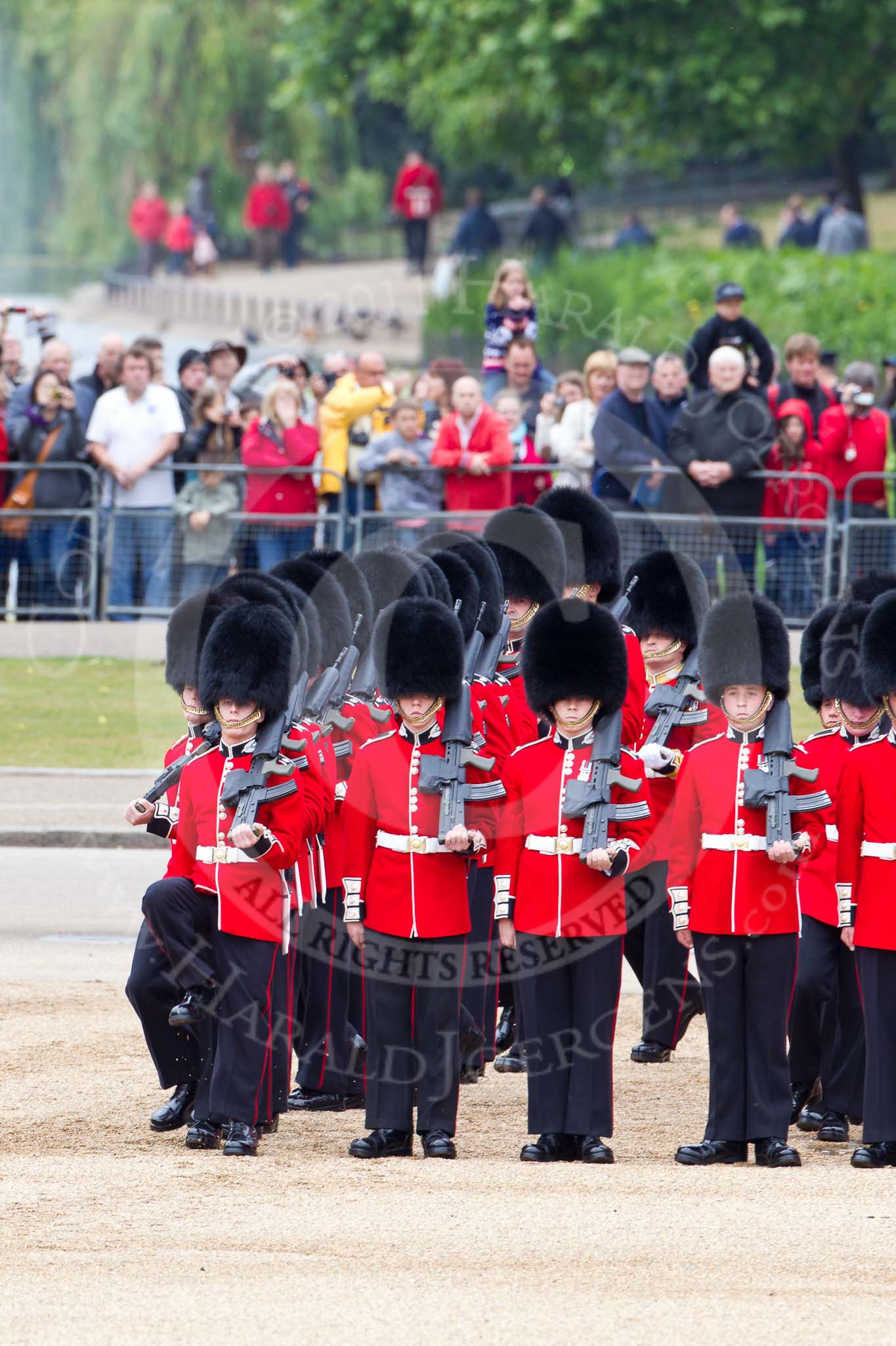The Major General's Review 2011: No. 1 Guard, 1st Battalion Scots Guards, the Escort for the Colour, getting into position. Behind them, spectators watching from St. James's Park..
Horse Guards Parade, Westminster,
London SW1,
Greater London,
United Kingdom,
on 28 May 2011 at 10:36, image #62