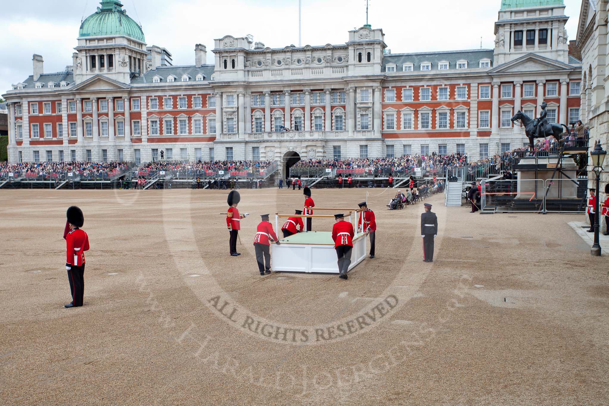 The Major General's Review 2011: Assembling the saluting base that will be used on the 'real' parade by HM The Queen, under the watchful eye of GSM 'Billy' Mott, left of the saluting base with the pace stick..
Horse Guards Parade, Westminster,
London SW1,
Greater London,
United Kingdom,
on 28 May 2011 at 10:51, image #90