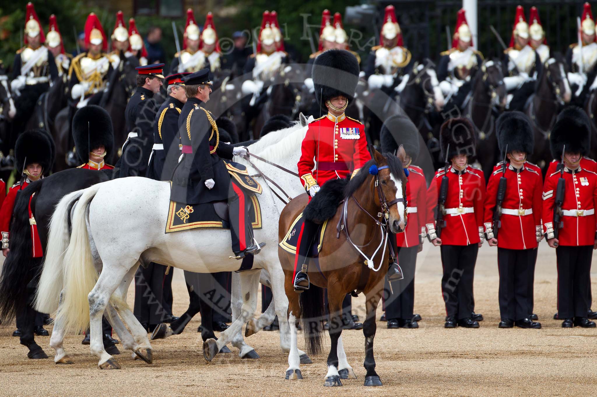 The Major General's Review 2011: The Inspection of the Line. The 'Royal Party', here the Crown Equerry and Equerry in Waiting, are riding behind the Field Officer, Lieutenant Colonel L P M Jopp, inspecting No. 2 Guard. In the background The Blues and Royals, Household Cavarly..
Horse Guards Parade, Westminster,
London SW1,
Greater London,
United Kingdom,
on 28 May 2011 at 11:03, image #120