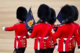 The Major General's Review 2011: The 'Keepers of the Ground', guardsmen of the participating guards divisions, marching towards their position on the parade ground. The flag of the 1st Battalion Scots Guards says 'En Ferus Hostis' - 'Behold A Fierce Enemy'..
Horse Guards Parade, Westminster,
London SW1,
Greater London,
United Kingdom,
on 28 May 2011 at 10:17, image #23