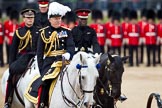 The Major General's Review 2011: The Major General that does the Major General's Review - Major General Commanding the Household Division and General Officer Commanding London District, Major General W G Cubitt, here following the carriage representing the ivory mounted phaeton that HM The Queen will be using. Behind him on the left, Captain Thomas Maitland-Mackill-Chrighton, Scots Guards, riding in place of the Duke of Kent, and Major Twumasi-Ankrah, Blues and Royals, in place of the Princess Royal..
Horse Guards Parade, Westminster,
London SW1,
Greater London,
United Kingdom,
on 28 May 2011 at 11:06, image #128