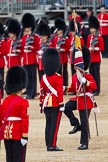 The Major General's Review 2011: A pivotal moment on Parade. Regimental Sergeant Major Ali Mackenzie holds the Regimental Colour whilst the Ensign, Lieutenant Tom Ogilvy, one of the junior Officers of the 1st Battalion Scots Guards, salutes the Colour with his sword. This young man is tasked to carry the Colour on the Queen’s Birthday Parade..
Horse Guards Parade, Westminster,
London SW1,
Greater London,
United Kingdom,
on 28 May 2011 at 11:20, image #162