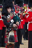 The Major General's Review 2011: A Piper of the  Band of the Scots Guards..
Horse Guards Parade, Westminster,
London SW1,
Greater London,
United Kingdom,
on 28 May 2011 at 11:45, image #225