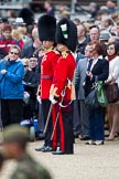 The Major General's Review 2011: After the rehearsal. Spectators getting ready to leave behind two officers from the Welsh Guards..
Horse Guards Parade, Westminster,
London SW1,
Greater London,
United Kingdom,
on 28 May 2011 at 12:15, image #295