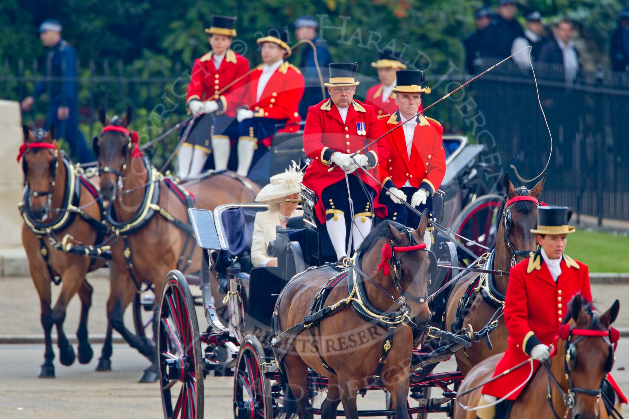 Trooping the Colour 2011: The first two barouche carriages arriving at Horse Guards Parade, in the first, just visible, HRH The Duchess of Cornwall, and, out of sight, HRH the Duchess of Cambridge, HRH Prince Henry of Wales (Prince Harry), and HRH Prince Andrew, the Duke of York..
Horse Guards Parade, Westminster,
London SW1,
Greater London,
United Kingdom,
on 11 June 2011 at 10:49, image #83