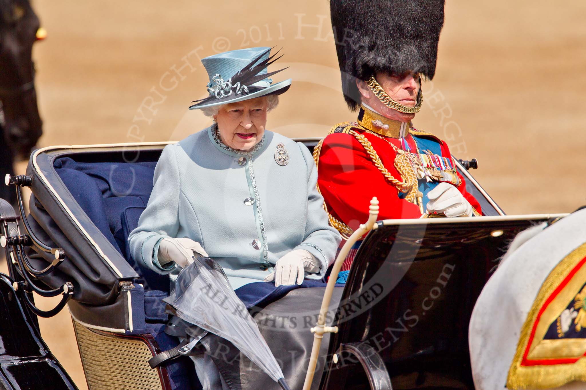 Trooping the Colour 2011: Her Majesty The Queen with Prince Philip in the ivory mounted phaeton, arriving on Horse Guards Parade, about to leave the carriage..
Horse Guards Parade, Westminster,
London SW1,
Greater London,
United Kingdom,
on 11 June 2011 at 10:59, image #128