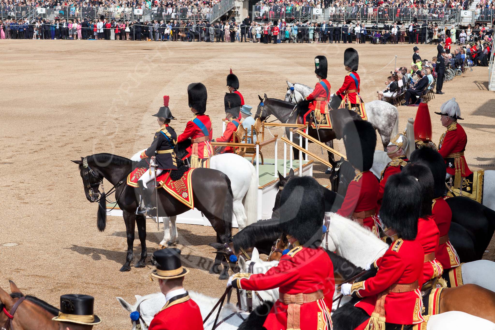 Trooping the Colour 2011: Watching the parade, HM The Queen and HRH Prince Philip, The Duke of Endinburgh, on their chairs on the saluting base. Next to them the Royal Colonels, from the left HRH Princess Anne, The Princess Royal, HRH Prince Edward, The Duke of Kent, HRH Prince Charles, The Prince of Wales, and HRH Prince William, The Duke of Cambridge..
Horse Guards Parade, Westminster,
London SW1,
Greater London,
United Kingdom,
on 11 June 2011 at 11:10, image #178