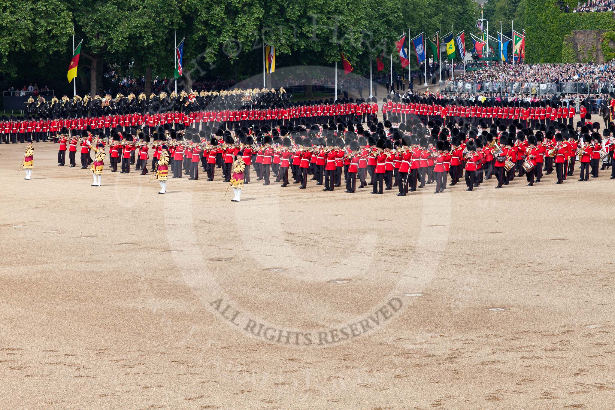 Trooping the Colour 2011: The Massed Bands, in the process of changing direction, lead by their Drum Majors..
Horse Guards Parade, Westminster,
London SW1,
Greater London,
United Kingdom,
on 11 June 2011 at 11:11, image #183