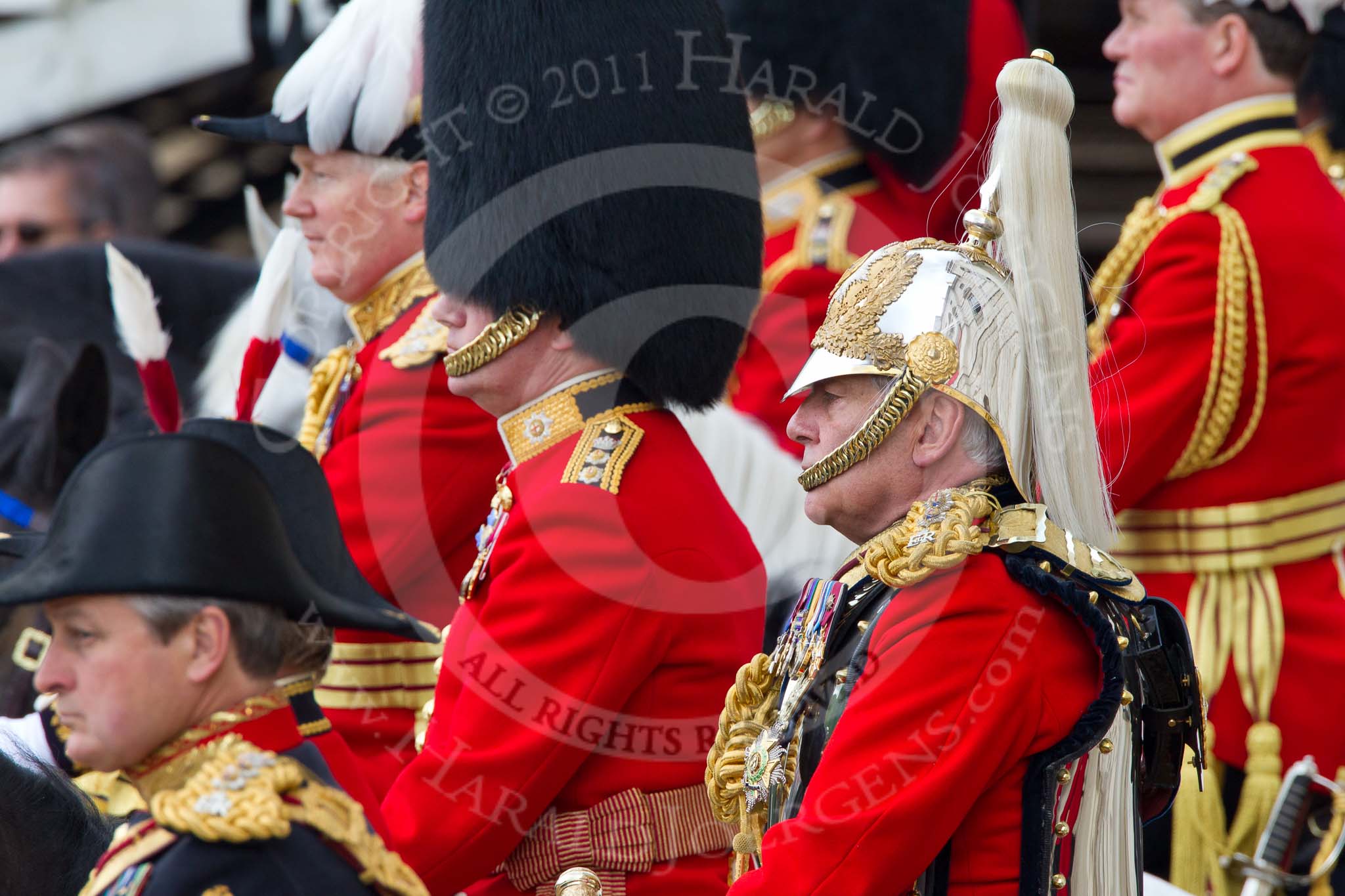 Trooping the Colour 2011: Front left, and out of focus, the Crown Equerry, Colonel W T Browne. Behind him General The Lord Guthrie of Craigiebank.
Next to him, Lieutenant General J J C Bucknall, Colonel Coldstream Guards, and, with the white feathers, Major General Commanding the Household Division, Major General W G Cubitt..
Horse Guards Parade, Westminster,
London SW1,
Greater London,
United Kingdom,
on 11 June 2011 at 11:13, image #186