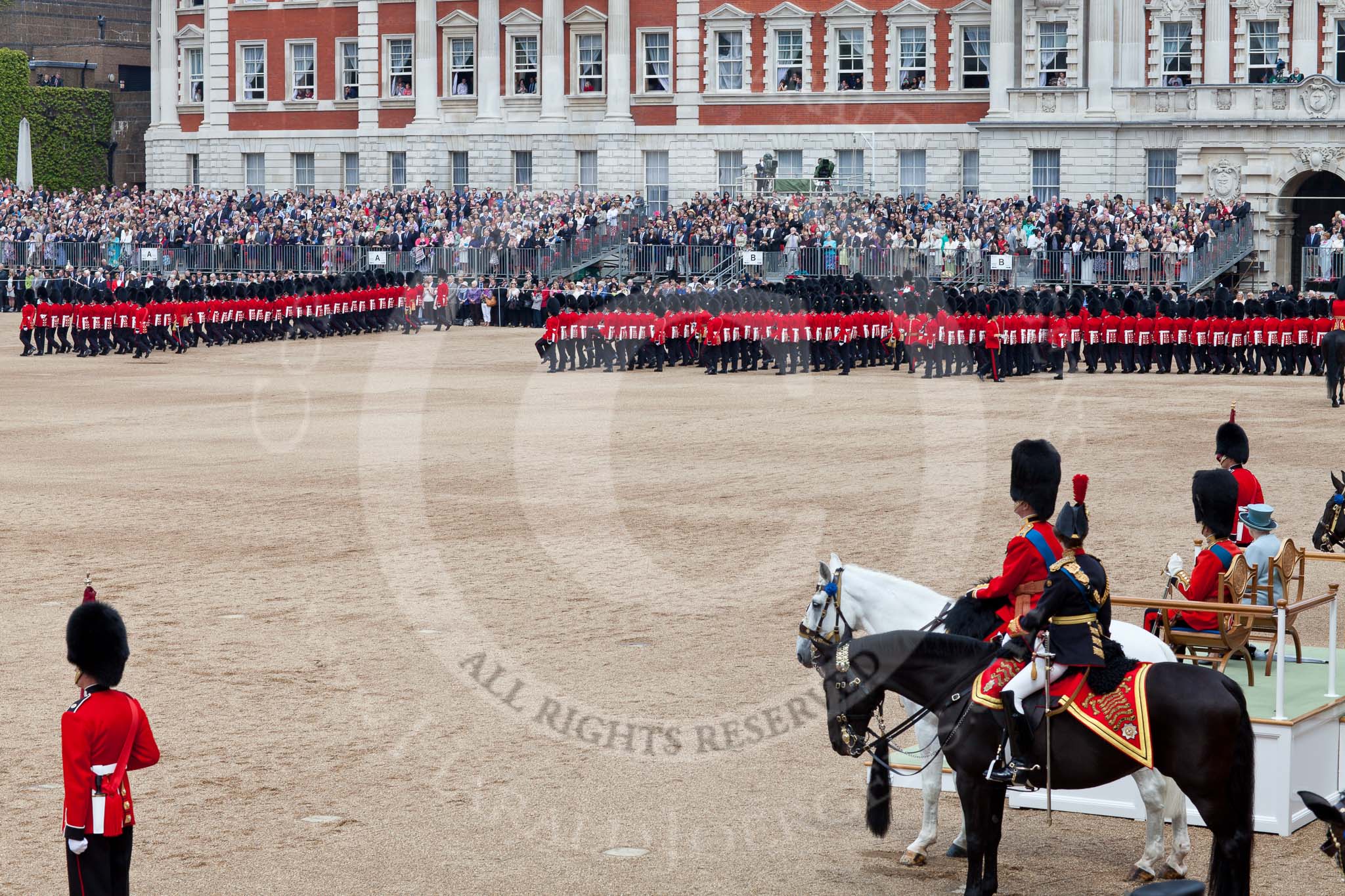 Photo 110611_114125_5D2_5360HaraldJoergens_ Trooping the Colour 2011: The Guards during the March Past. On the right of the photo, as Royal Colonels, HRH Princess Anne, The Princess Royal, and HRH Prince Edward, The Duke of Kent. On the saluting base HM The Queen and HRH Prince Philip, The Duke of Edinburgh..
Horse Guards Parade, Westminster,
London SW1,
Greater London,
United Kingdom,
on 11 June 2011 at 11:41, image #259