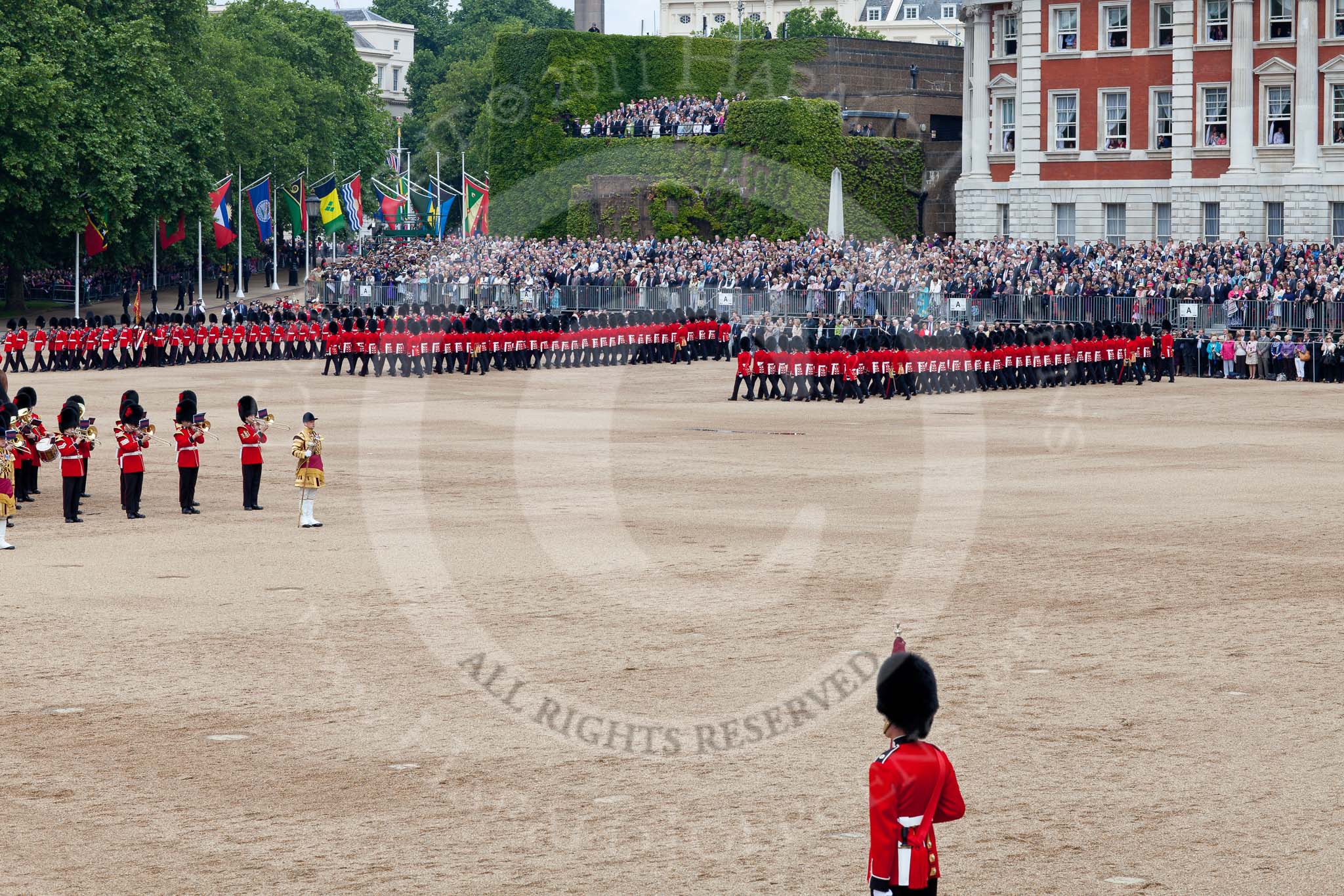 Photo 110611_114129_5D2_5364HaraldJoergens_ Trooping the Colour 2011: The March Past. On the left, the Massed Bands playing, marching, on the right of the photo, the guards. On Top, No. 1 Guards, the Escort to the Colour, carrying the Colour..
Horse Guards Parade, Westminster,
London SW1,
Greater London,
United Kingdom,
on 11 June 2011 at 11:41, image #260