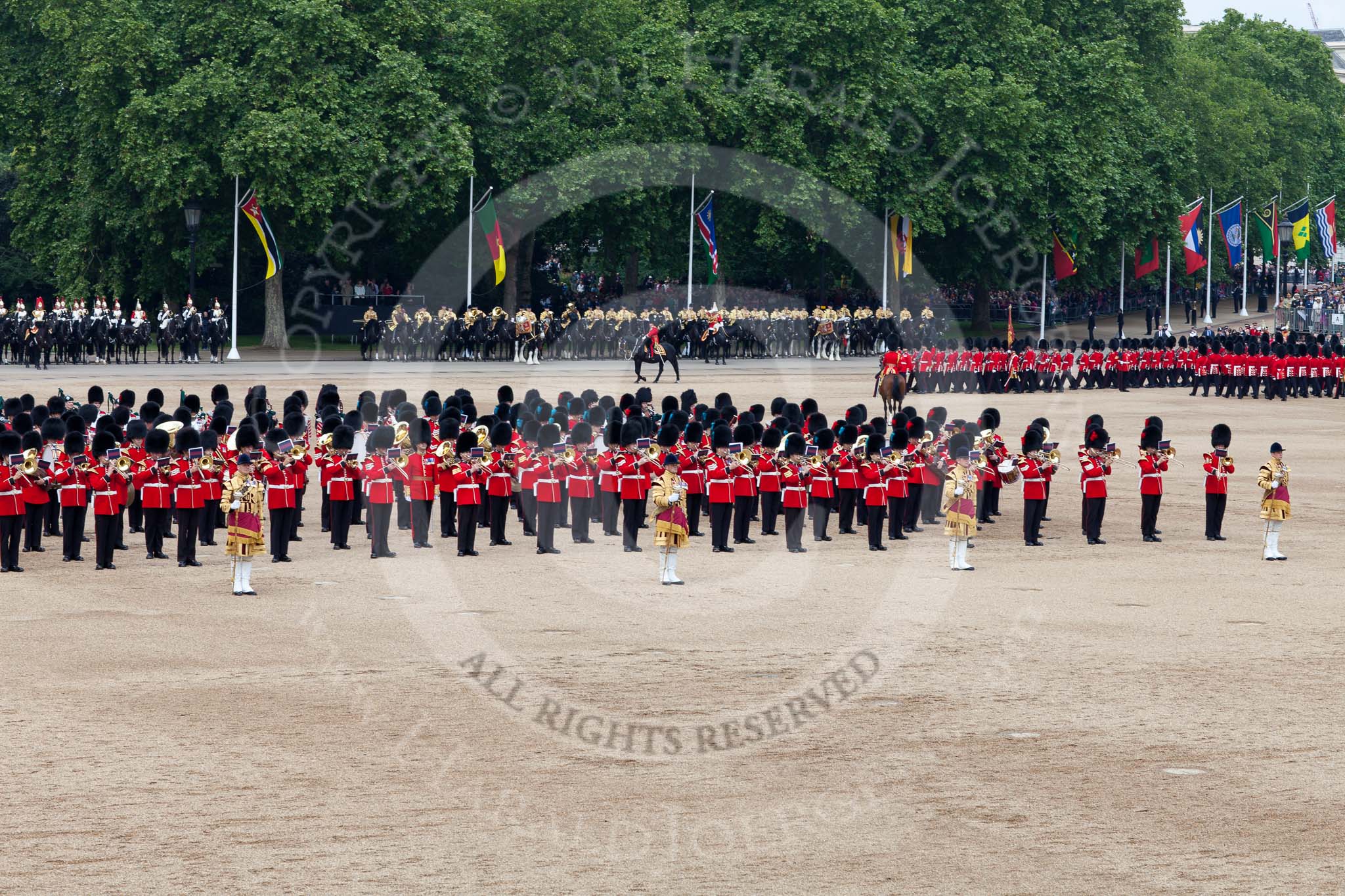 Photo 110611_114137_5D2_5372HaraldJoergens_ Trooping the Colour 2011: The March Past. On the left, the Massed Bands playing, marching, on the right of the photo, the guards divisions. On Top, No. 1 Guards, the Escort to the Colour, carrying the Colour.
On the backgound the Mounted Bands of the Household Divison, and on the left The Blues and Royals of the Household Cavalry..
Horse Guards Parade, Westminster,
London SW1,
Greater London,
United Kingdom,
on 11 June 2011 at 11:41, image #262