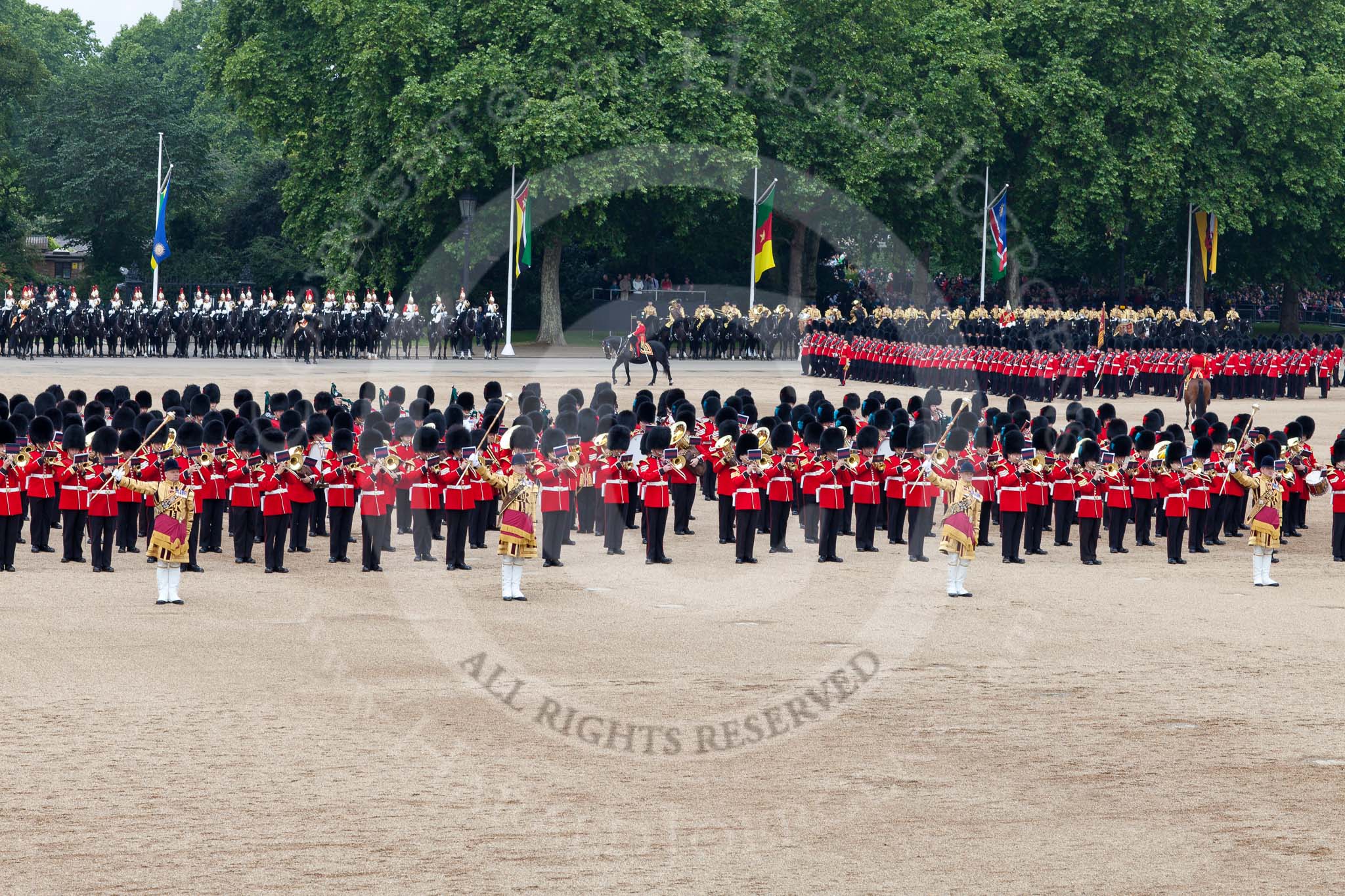 Photo 110611_114251_5D2_5390HaraldJoergens_ Trooping the Colour 2011: The March Past. On the left, the Massed Bands playing, marching, on the right of the photo, the guards divisions. On Top, No. 1 Guards, the Escort to the Colour, carrying the Colour.
On the backgound the Mounted Bands of the Household Divison, and on the left the Blues and Royals of The Household Cavalry..
Horse Guards Parade, Westminster,
London SW1,
Greater London,
United Kingdom,
on 11 June 2011 at 11:42, image #265