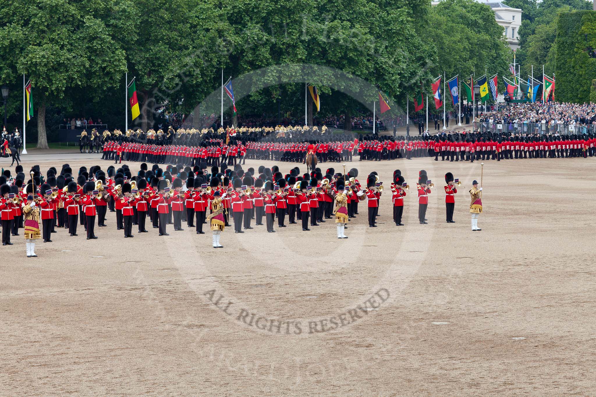 Photo 110611_114257_5D2_5395HaraldJoergens_ Trooping the Colour 2011: The March Past. On the left, the Massed Bands playing, marching, on the right of the photo, the guards divisions. On Top, No. 1 Guards, the Escort to the Colour, carrying the Colour.
On the backgound the Mounted Bands of the Household Divison, and on the left The Blues and Royals of the Household Cavalry..
Horse Guards Parade, Westminster,
London SW1,
Greater London,
United Kingdom,
on 11 June 2011 at 11:42, image #266