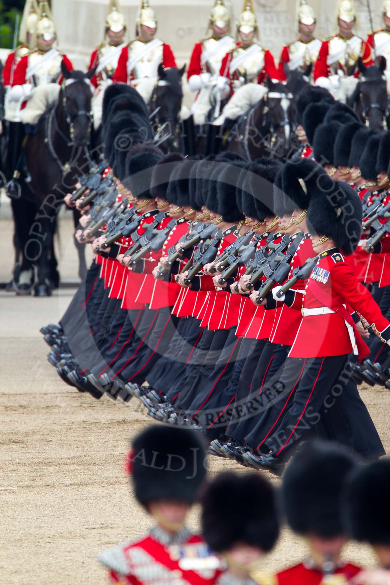 Trooping the Colour 2011: No. 4 Guard, Nijmegen Company Grenadier Guards, during the March Past. In the background, The Life Guards from the Household Cavalry..
Horse Guards Parade, Westminster,
London SW1,
Greater London,
United Kingdom,
on 11 June 2011 at 11:44, image #282