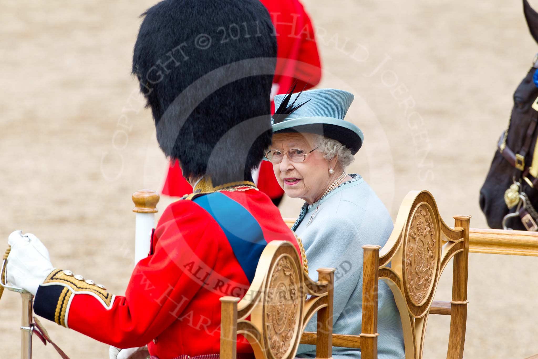Trooping the Colour 2011: HM The Queen talking to HRH Prince Philip, The Duke of Edinburgh..
Horse Guards Parade, Westminster,
London SW1,
Greater London,
United Kingdom,
on 11 June 2011 at 11:49, image #296