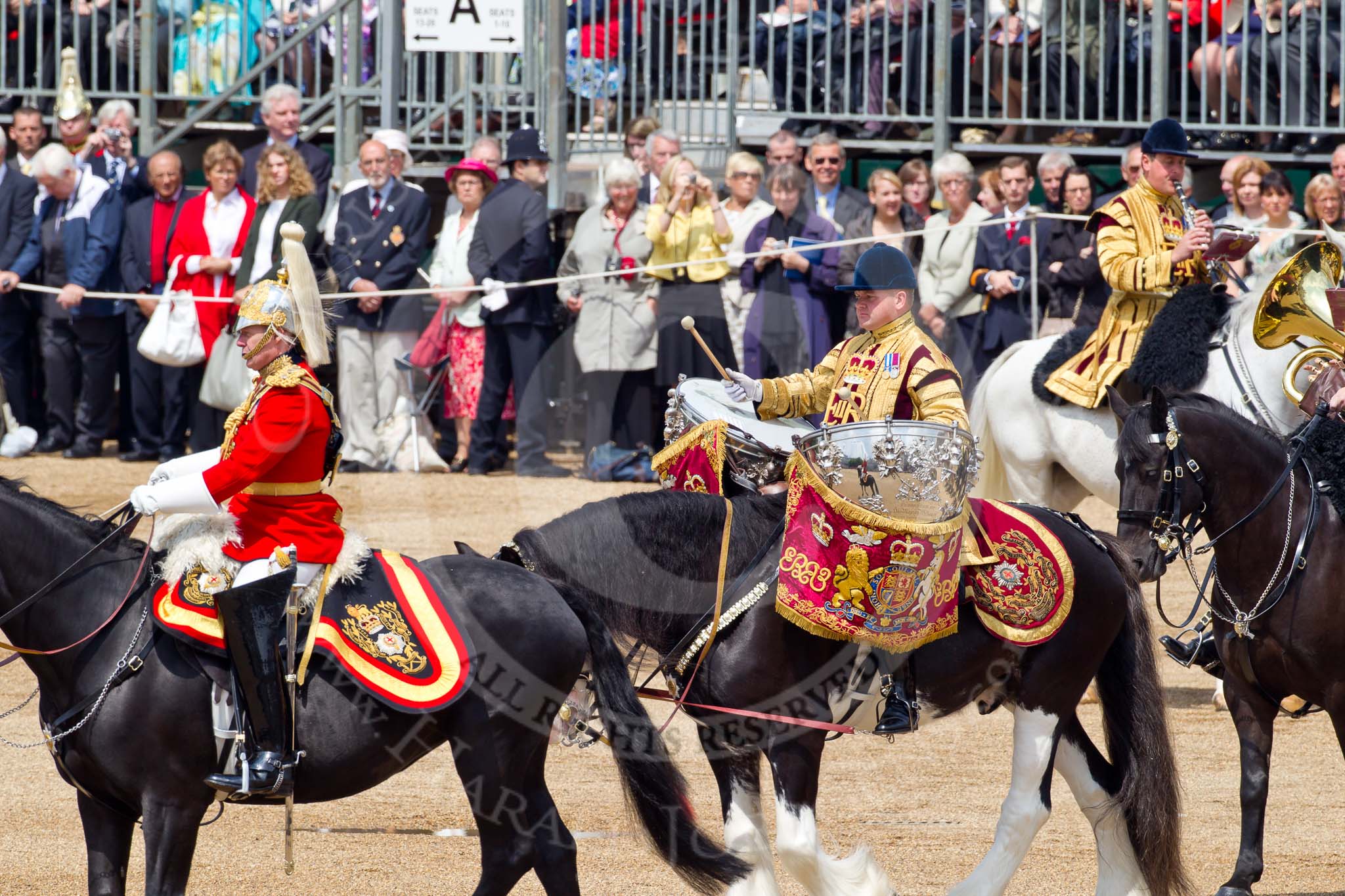 Photo 110611_115400_1D4_4763HaraldJoergens_ Trooping the Colour 2011: The Mounted Bands of the Household Cavalry moving onto the parade ground. In red Major K L Davies, The Life Guards, Director of Music, behind him one of the two kettle drummers..
Horse Guards Parade, Westminster,
London SW1,
Greater London,
United Kingdom,
on 11 June 2011 at 11:54, image #318