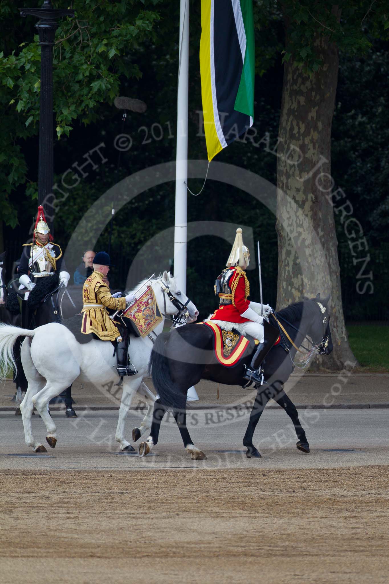 Trooping the Colour 2011: March Off. Here, the Field Officer of the Escort, and the Trumpeter, are leaving Horse Guards Parade towards The Mall..
Horse Guards Parade, Westminster,
London SW1,
Greater London,
United Kingdom,
on 11 June 2011 at 12:05, image #387