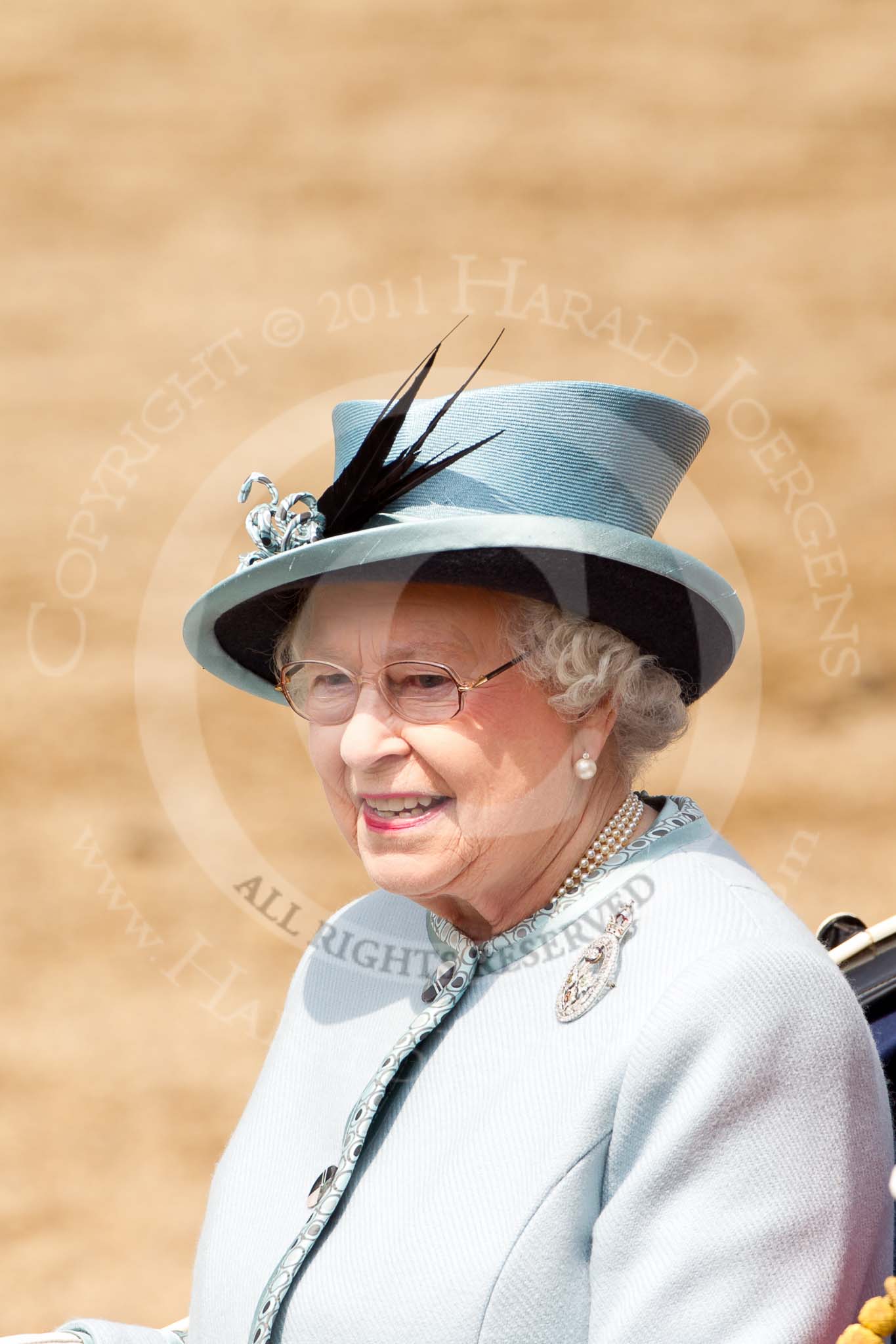 Trooping the Colour 2011: Close-up of HM The Queen at the end of the parade, back in the ivory mounted phaeton, about to leave the parade ground..
Horse Guards Parade, Westminster,
London SW1,
Greater London,
United Kingdom,
on 11 June 2011 at 12:09, image #410