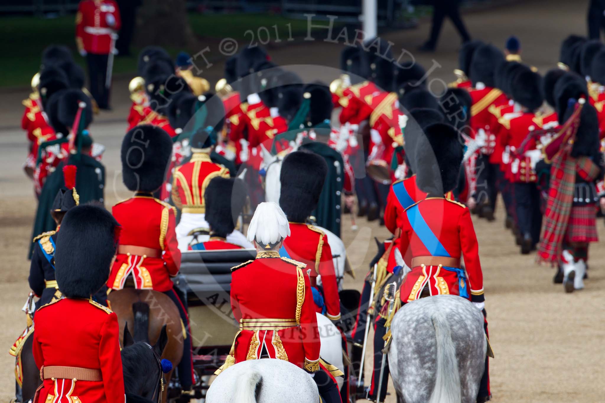 Photo 110611_121101_1D4_5502HaraldJoergens_ Trooping the Colour 2011: The March Off, the Massed Bands leaving the parade ground, followed by the Royal Procession. Behind the ivory mounted phaeton, on the left HRH Princess Anne, The Princess Royal, Colonel Blues and Royals, on her right Brigade Major Household Division Lincoln Speed, Scots Guards, on his right HRH Prince Edward, the Duke of Kent, Colonel Scots Guards, and next to him HRH Prince William, The Duke of Cambridge, Colonel Irish Guards. In front of him HRH Prince Charles, The Prince of Wales, Colonel Welsh Guards.
Following them, with the white feathers, Major General Cubitt..
Horse Guards Parade, Westminster,
London SW1,
Greater London,
United Kingdom,
on 11 June 2011 at 12:11, image #421